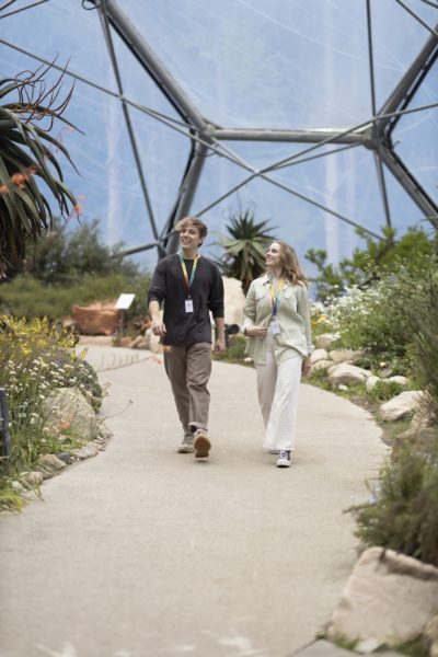 Two students walk through the Mediterranean Biome at the Eden Project